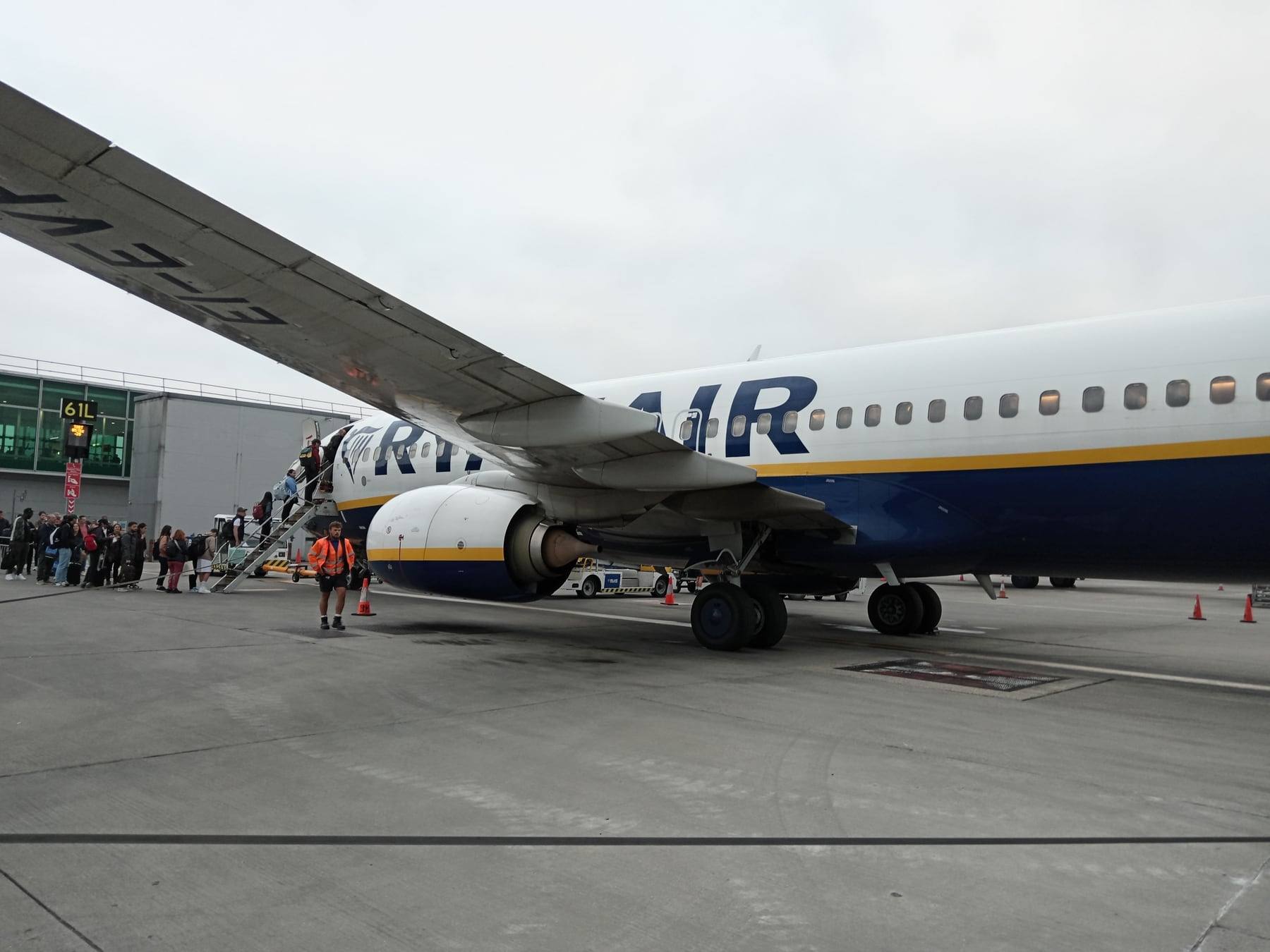 Passengers boarding a Ryanair aircraft at London Stansted Airport