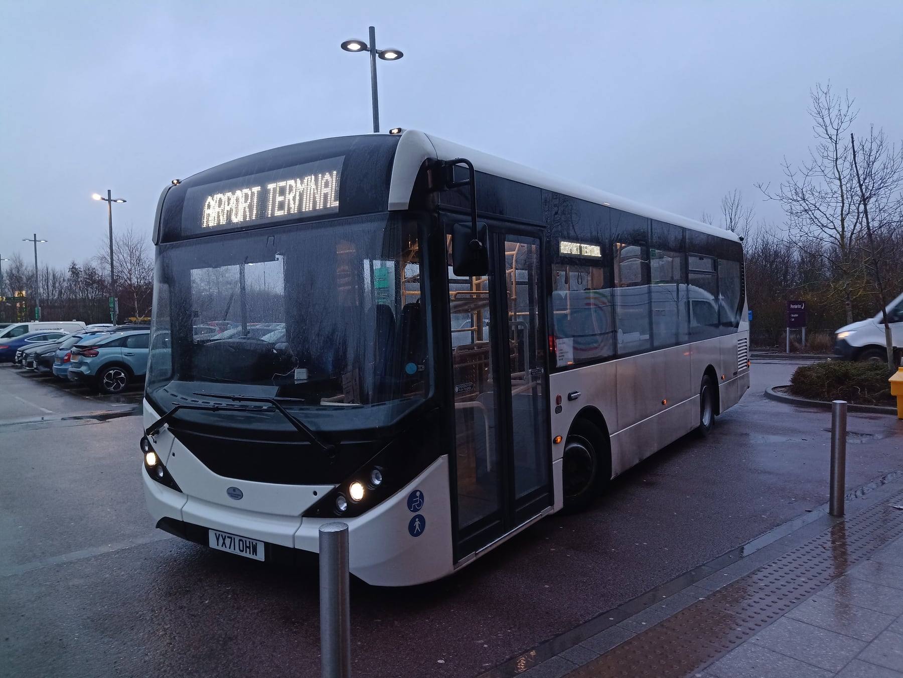 A single-deck bus at Stansted Airport showing an Airport Terminal destination display