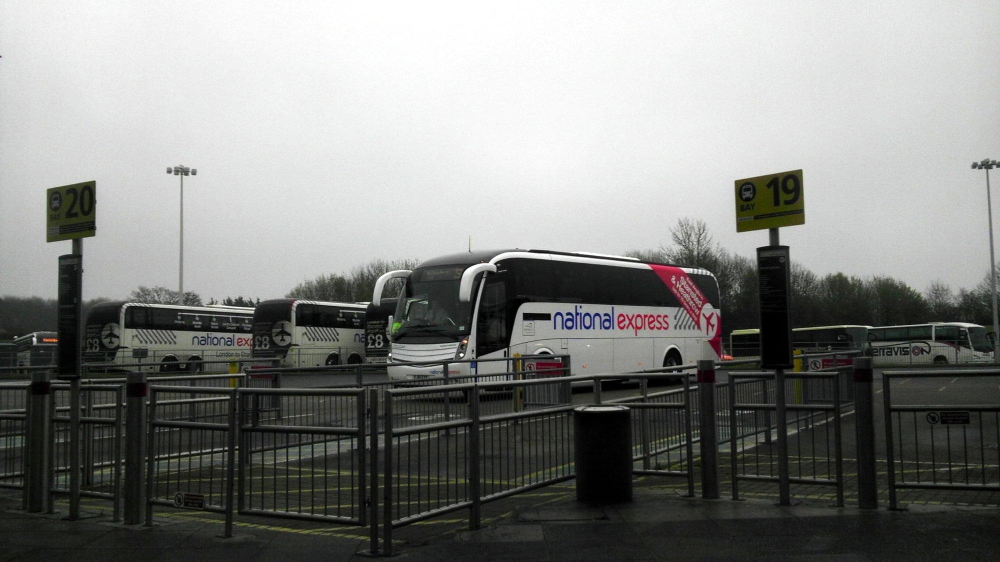National Express coaches at the numbered bays of Stansted Airport coach station